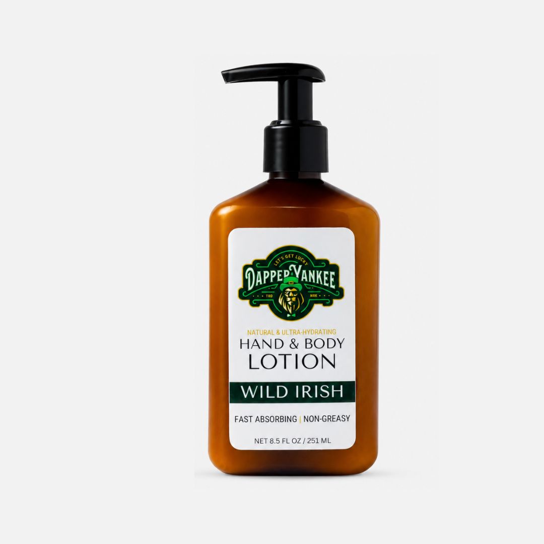 A bottle of Dapper Yankee Hand & Body Lotion in the Wild Irish scent, featuring an amber-brown translucent bottle with a black pump dispenser and a white label.