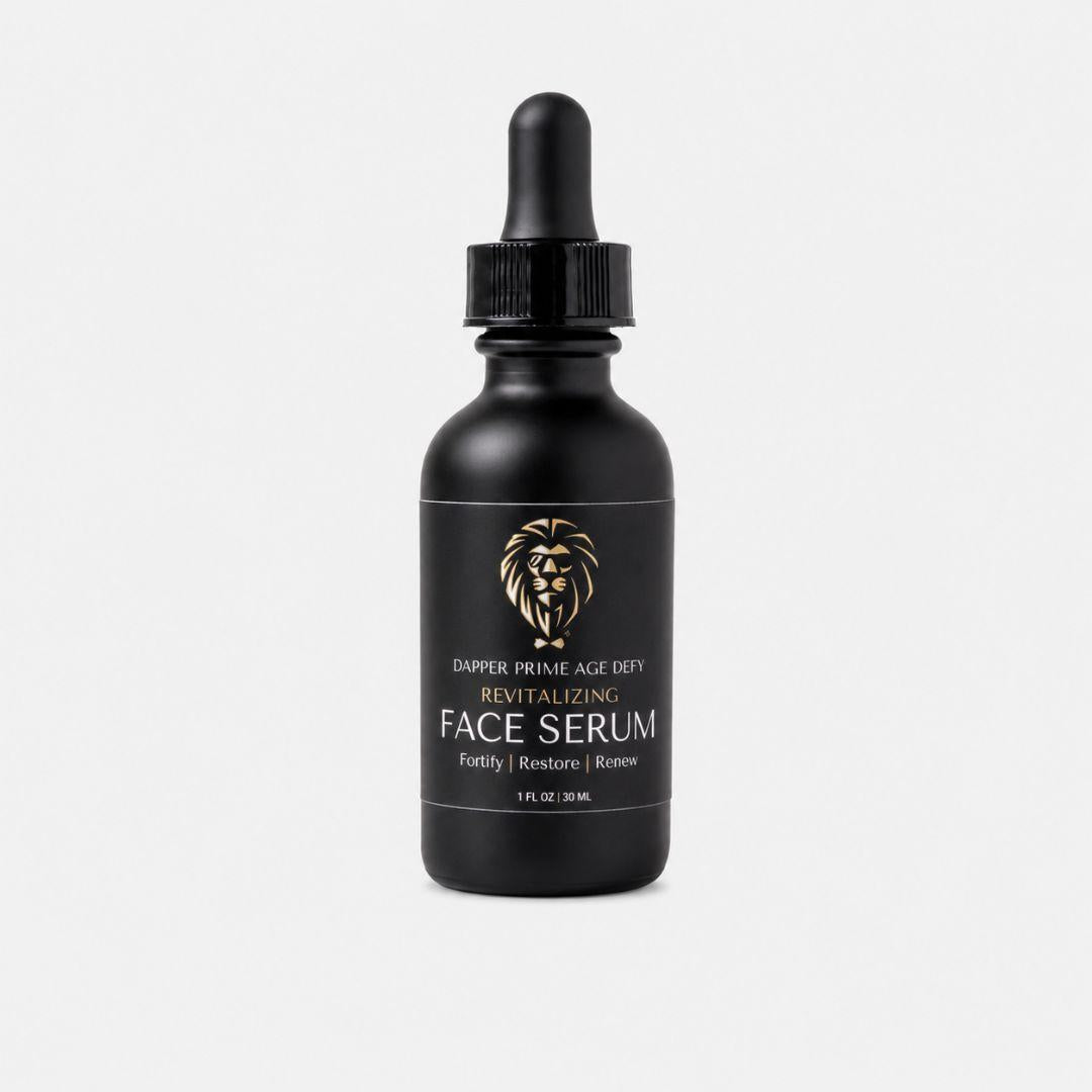 A black glass dropper bottle of Dapper Prime Ace Defy Face Serum with a black dropper cap and a black label featuring a gold lion logo and text, set against a plain light gray background.