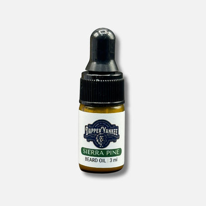 Bottle of Dapper Yankee Sierra Pine beard oil on a white background